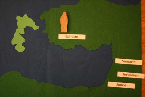 felt illustration of John traveling from Jerusalem to Ephasus to tell the good news.