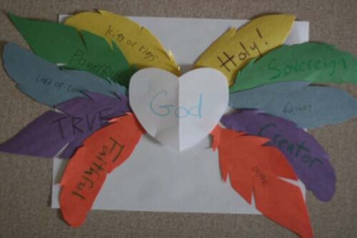 feather craft with a white heart in the middle