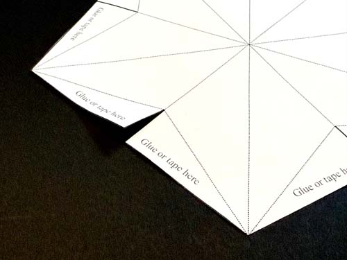 Image of star template being cut 